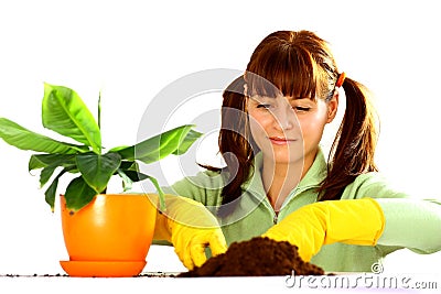 Woman planting a flower Stock Photo