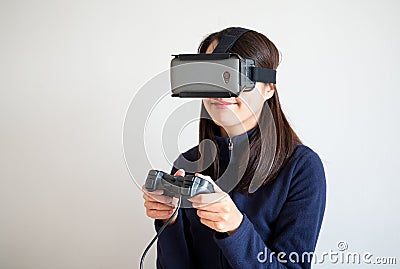 Woman play game with vr device Stock Photo