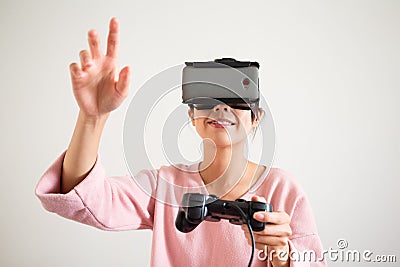 Woman play game with vr device and hand want to touch some Stock Photo