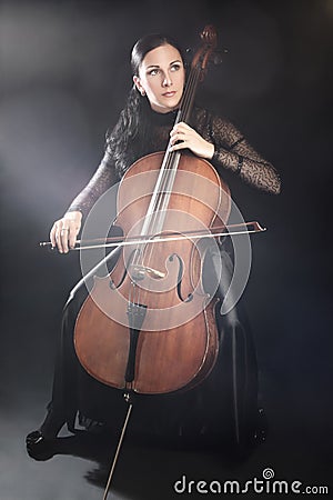 Woman playing cello Stock Photo