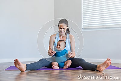 Woman playing with infant Stock Photo