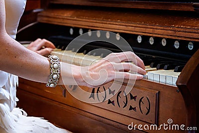 Woman playing piano Stock Photo