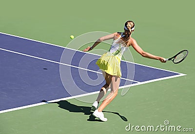 Woman playing tennis Stock Photo