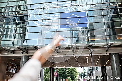 Woman pointing on the european flag Stock Photo