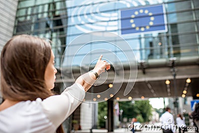 Woman pointing on the european flag Stock Photo