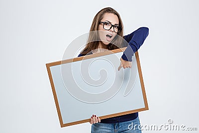 Woman pointing finger on blank board Stock Photo