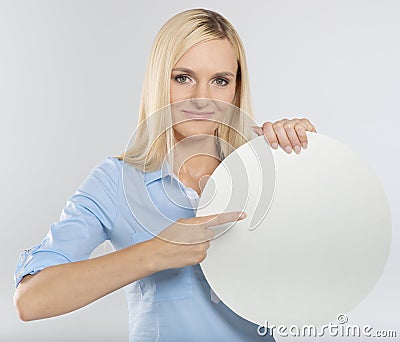 Woman pointing to a blank board Stock Photo