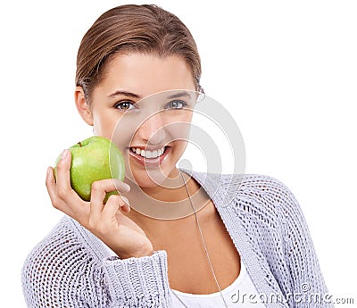 Woman, portrait and apple, nutrition and gut health with snack, happy with diet for weight loss on white background Stock Photo