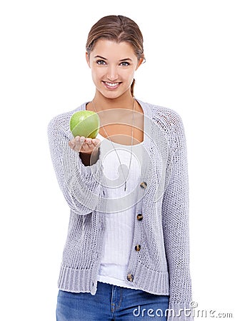 Woman, portrait and apple, nutrition and health with snack or meal, happy with diet for weight loss on white background Stock Photo