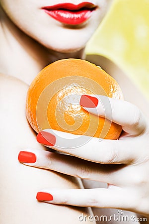 Woman Portrait holding a mandarin orange tangerine Stock Photo