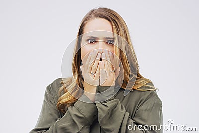 Woman, portrait and shock in studio for fear, alarm and wtf or omg for risk on white background. Female person, surprise Stock Photo