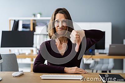 Woman Portrait Showing Dislike Thumbs Down Stock Photo