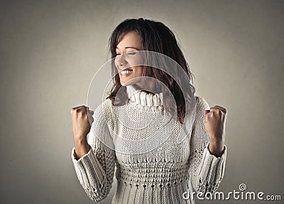 Woman in pose of triumph Stock Photo