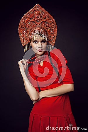 Woman posing in metal headwear Stock Photo