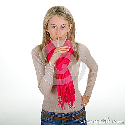 Woman posing a silence gesture Stock Photo