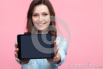 Woman posing with table Stock Photo