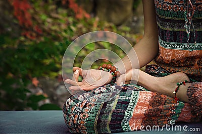 woman practice yoga meditation hands in mudra gesture closeup outdoor autumn day Stock Photo
