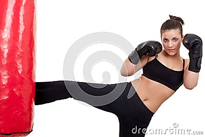 Woman practicing kickbox Stock Photo