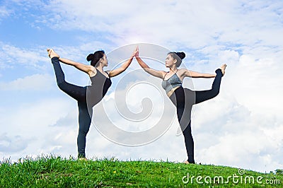 Woman practicing yoga relax in nature and blue sky background Editorial Stock Photo