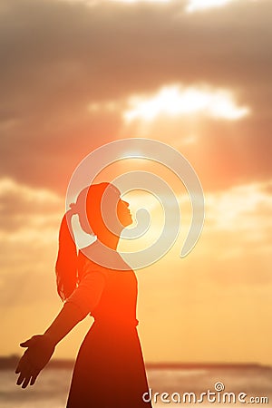 Woman pray pious Stock Photo