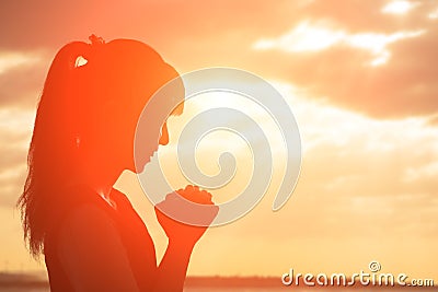 Woman pray pious Stock Photo