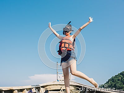 Woman prepare for snokeling. Stock Photo