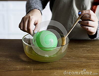 Woman preparing a gelatin globe Stock Photo