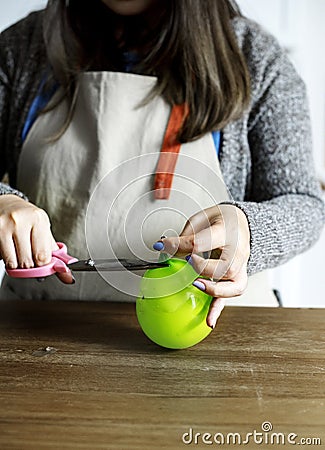 Woman preparing a gelatin globe Stock Photo