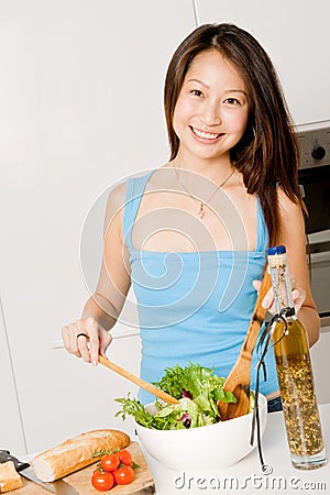 Woman Preparing Meal Stock Photo