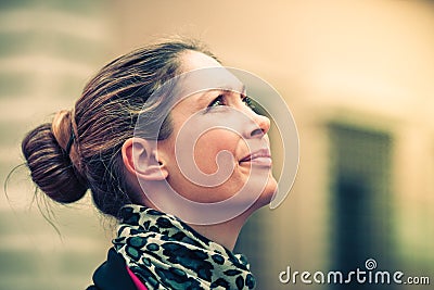 Woman profile looking up. Natural expression Stock Photo