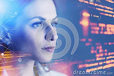 Woman programmer looking at code Stock Photo