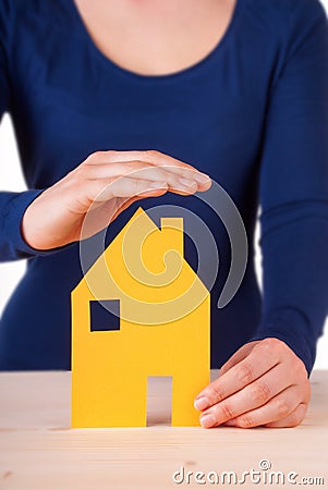 Woman Protecting House Stock Photo