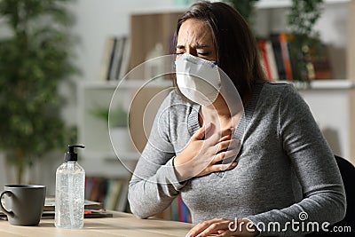 Woman suffocating due at nigh at home Stock Photo