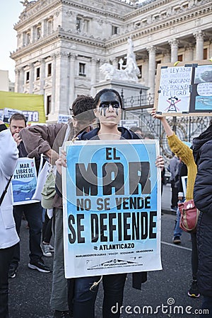 Woman protesting against offshore oil exploitation in Argentina Editorial Stock Photo