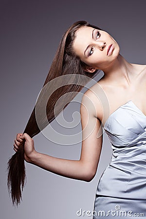 Woman pulls her hair Stock Photo