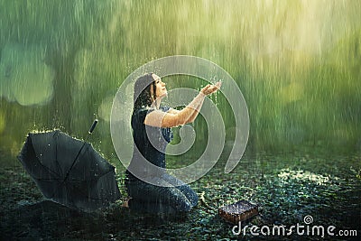 Woman and rain shower Stock Photo