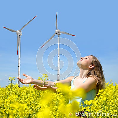 Woman on rapeseed field Stock Photo