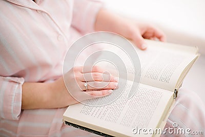 woman reading a book close up Stock Photo