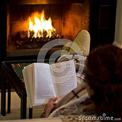 Woman Reading By Fireplace Royalty Free Stock Photography Woman Reading By Fireplace Royalty Free Stock Photography