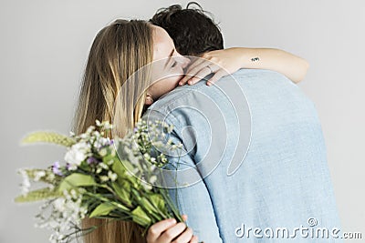 Woman receive a bouquet of flower from her lover Stock Photo