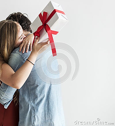 Woman receive a gift box from her lover Stock Photo