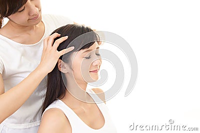 Woman receives scalp massage Stock Photo