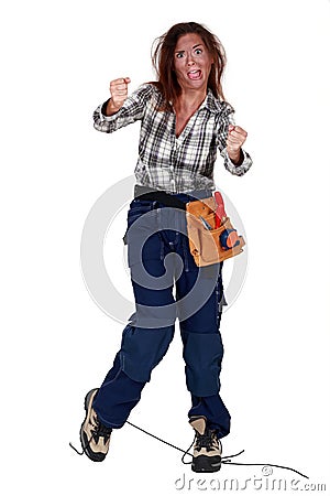 Woman receiving electrical shock Stock Photo