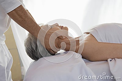 Woman Receiving Massage Stock Photo