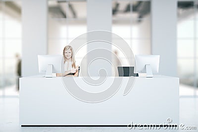 Woman at reception desk Stock Photo