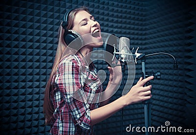Woman in a recording studio Stock Photo