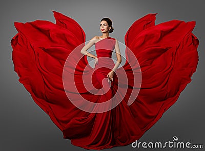 Woman Red Dress, Fashion Model in Long Silk Waving Gown Wings, Flying Fluttering Fabric Stock Photo