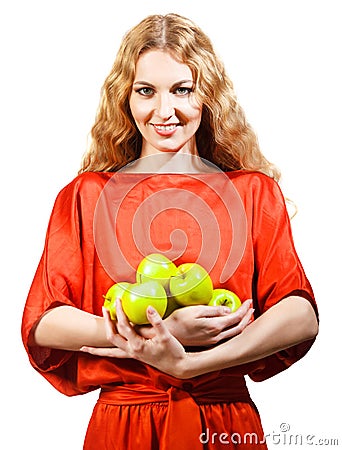 Woman in red holding apples in her hands Stock Photo