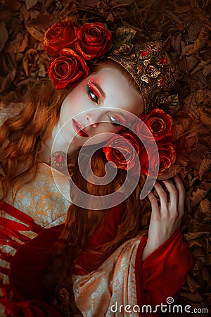 Woman in red medieval dress Stock Photo