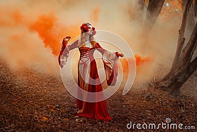 Woman in red medieval dress Stock Photo